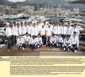 Motorsports: FIA Formula One World Championship 2012, Grand Prix of Monaco, Deutsche Fussball Nationalmannschaft besucht das Team Mercedes GP, hi.v.li.: Tim Wiese, Mario Gomez, Mesut Özil, Sami Khedira, Ron-Robert Zieler, Benedikt Höwedes, Bastian Schweinsteiger, Holger Badstuber, Per Mertesacker, Manuel Neuer, Jerome Boateng, Toni Kroos, Marc-Andre ter Stegen, Marcel Schmelzer, Marco Reus, Miroslav Klose und Lars Bender; Mitte Michael Schumacher und Nico Rosberg; vorn: Sven Bender, Ilkay Gündogan, Cacau, Philipp Lahm, Thomas Müller, Andre Schürrle, Lukas Podolski und Julian Draxler xHOCHxZWEIx