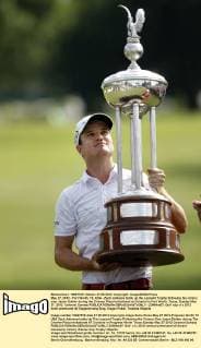 May 27, 2012 - Fort Worth, TX, USA - Zach Johnson holds up the Leonard Trophy following his victory over Jason Dufner during the Crowne Plaza Invitational at Colonial in Fort Worth, Texas, Sunday May 27, 2012. Colonial Sunday - ZUMAm67