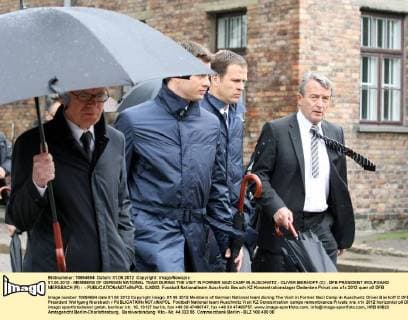 01.06.2012 - MEMBERS OF GERMAN NATIONAL TEAM DURING THE VISIT IN FORMER NAZI CAMP IN AUSCHWITZ - OLIVER BIERHOFF (C) , DFB PRÄSIDENT WOLFGANG NIERSBACH (R) - -  0J4002