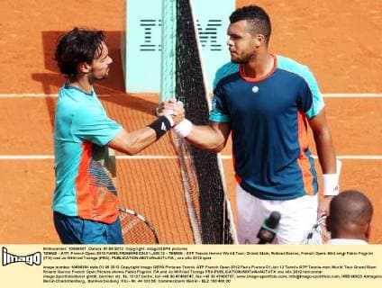 TENNIS - ATP, French Open 2012 PARIS,FRANKREICH,01.JUN.12 - TENNIS - ATP Tennis Herren World Tour, Grand Slam, Roland Garros, French Open. Bild zeigt Fabio Fognini (ITA) und Jo-Wilfried Tsonga (FRA). 