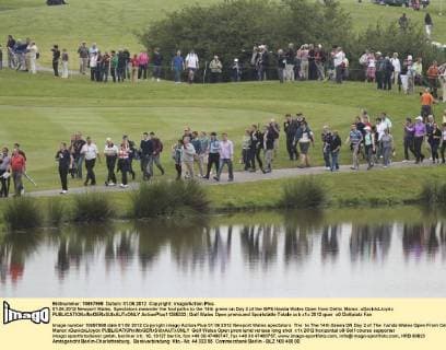 01.06.2012 Newport Wales. Spectators meander the footpaths to the 14th green on Day 2 of the ISPS Handa Wales Open from Celtic Manor. xDavidxLloydx  ActionPlus11285332