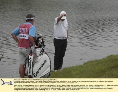 01.06.2012 Newport Wales. Marcus Fraser (AUS) drops two shots in the water hazard at the 6th on Day 2 of the ISPS Handa Wales Open from Celtic Manor. xDavidxLloydx  ActionPlus11285301