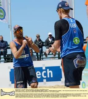 BEACH VOLLEYBALL - CEV EM 2012 DEN HAAG,NIEDERLANDE,02.JUN.12 - DIVERS, BEACHVOLLEYBALL - CEV Europameisterschaft 2012, Herren. Bild zeigt Julius Brink (GER) und Jonas Reckermann (GER). 