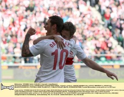 02.06.2012 WARSZAWA ULICA LAZIENKOWSKA STADION PEPSI ARENA - Poland vs. Andorra - RADOSC BRAMKA GOL LUDOVIC OBRANIAK (L) JAKUB Kuba BLASZCZYKOWSKI (R) ( FOOTBALL GAME POLAND CUP )  20120602CSMT8008