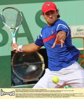 Eduardo Schwank of Argentina hits a shot during his French Open mens third round match at Roland Garros in Paris on June 2, 2012.  PAR20120602737