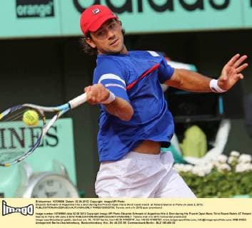 Eduardo Schwank of Argentina hits a shot during his French Open mens third round match at Roland Garros in Paris on June 2, 2012.  PAR20120602739