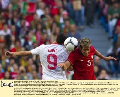 2 Jun 2012 - Lisbon, Portugal - Fabio Coentrao Portuguese Defender (R) and Umut Bulut Turkey Forward (L) during the last preparation soccer match between Portugal and Turkey, on June 2 in Luz Stadium Lisbon, before the beginning of the Euro 2012. 