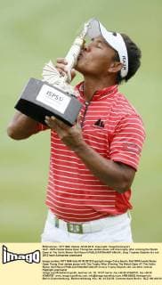 Golf - ISPA Handa Wales Open Thongchai Jaidee poses with the trophy after winning the Welsh Open at The Celtic Manor Golf Resort 