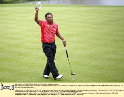 Golf - ISPA Handa Wales Open Thongchai Jaidee acknowledges the crowd as he wins the Welsh Open at The Celtic Manor Golf Resort 