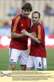 Spain s Fernando LLorente (l) and Andres Iniesta during friendly match.June 3,2012.  (20120603548)