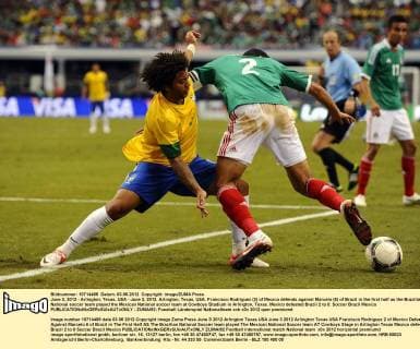June 3, 2012 - Arlington, Texas, USA - June 3, 2012. Arlington, Texas, USA. Francisco Rodriguez (2) of Mexico defends against Marcelo (6) of Brazil in the first half as the Brazilian National soccer team played the Mexican National soccer team at Cowboys Stadium in Arlington, Texas. Mexico defeated Brazil 2 to 0. Soccer Brazil Mexico - ZUMAl92
