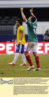 June 3, 2012 - Arlington, Texas, USA - June 3, 2012. Arlington, Texas, USA. Javier Chicharito Hernandez (14) of Mexico celebrates his penalty shot goal in the first half as the Brazilian National soccer team played the Mexican National soccer team at Cowboys Stadium in Arlington, Texas. Mexico defeated Brazil 2 to 0. Soccer Brazil Mexico - ZUMAl92