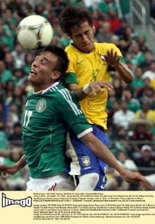 June 3, 2012 - Arlington, TX, USA - Jesus Zavala (17) of Mexico heads the ball away from Neymar da Silva (11) of Brazil during the Mexico vs Brazil soccer match at Cowboys Stadium Sunday, June 3, 2012, in Arlington, Texas. Mexico vs Brazil - ZUMAm67