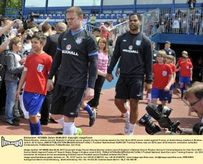 Wayne Rooney, Joleon Lescott, England s national soccer players during a training session for their Euro 2012 soccer match against France, at Suche Stawy stadium in Krakow June 8, 2012 mawo_080612 