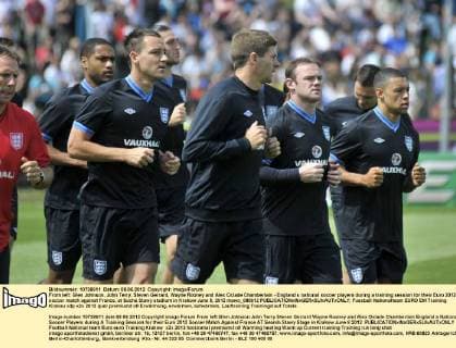 From left: Glen Johnson, John Terry, Steven Gerrard, Wayne Rooney and Alex Oxlade Chamberlain - England s national soccer players during a training session for their Euro 2012 soccer match against France, at Suche Stawy stadium in Krakow June 8, 2012 mawo_080612 