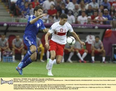 Warsaw - Poland - Greece - ROBERT LEWANDOWSKI (R) - Sokratis Papastathopoulos -  20120608CSKP4001