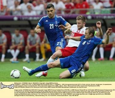 FUSSBALL - EURO 2012, POL vs GRE WARSCHAU,POLEN,08.JUN.12 - FUSSBALL - UEFA Europameisterschaft 2012 in Polen und der Ukraine, Länderspiel, Gruppenphase, Eröffnungsspiel, Polen vs Griechenland. Bild zeigt Kostas Katsouranis (GRE), Jakub - Kuba - Blaszczykowski (POL) und Avraam Papadopoulos (GRE). 