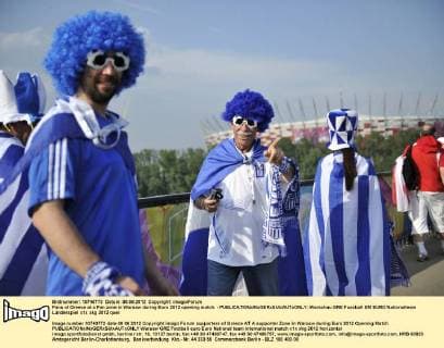 Fans of Greece at a Fan zone in Warsaw during Euro 2012 opening match - 