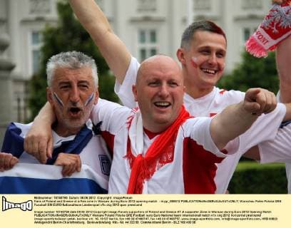 Fans of Poland and Greece at a Fan zone in Warsaw during Euro 2012 opening match - mygr_080612 