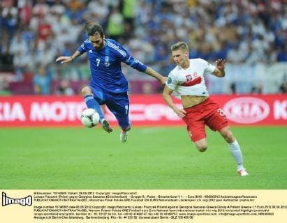 Lukasz Piszczek (Polen) gegen Georgios Samaras (Griechenland) - Gruppe A - Polen - Griechenland 1:1 - - Euro 2012 - 08 06 2012 ActionImagesxPanoramic 