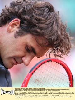 Roger Federer of Switzerland reacts after the semifinal match of men s singles at the French Open tennis tournament in Paris 