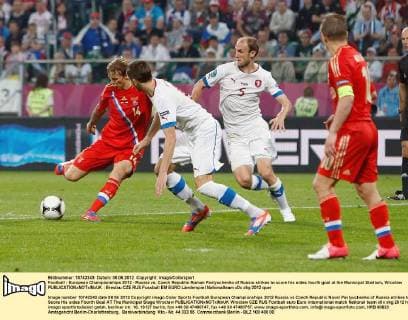 Football - European Championships 2012 - Russia vs. Czech Republic Roman Pavlyuchenko of Russia strikes to score his sides fourth goal at the Municipal Stadium, Wroclaw 