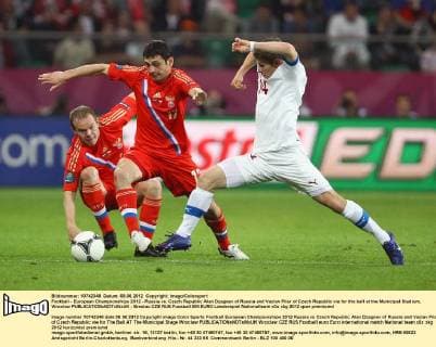 Football - European Championships 2012 - Russia vs. Czech Republic Alan Dzagoev of Russia and Vaclav Pilar of Czech Republic vie for the ball at the Municipal Stadium, Wroclaw 
