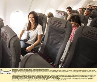 Silvia Meichel, Freundin von Mario Gomez im Flugzeug beim Flug Danzig-Lviv Frau, Ehefrau, Partnerin, Freundin, zusammen, Spielerfrau, Begleitung, weiblich, wife, woman, DEUTSCHLAND, Gruppenspiel, Gruppe B , Deutsche Fussball Nationalmannschaft, DFB EM Euro 2012 am 09.06.2012 in Lviv, Lemberg