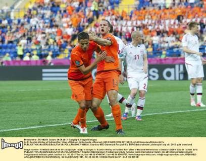 (L-R) Ibrahim Afellay of Holland,Ron Vlaar of Holland Netherlands v Denmark UEFA EURO 2012 2011 2012 xVIxWillemxJanxDijkdrentxIVx 964926