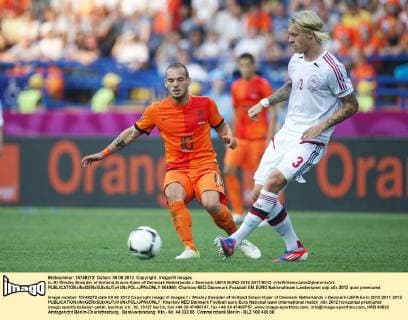 (L-R) Wesley Sneijder of Holland,Simon Kjaer of Denmark Netherlands v Denmark UEFA EURO 2012 2011 2012 xVIxWillemxJanxDijkdrentxIVx 964968