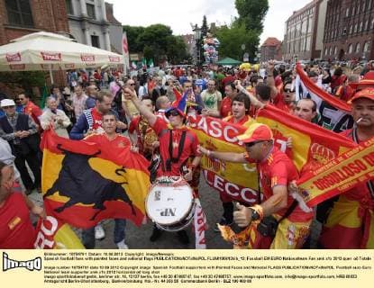 Spanish football fans with painted faces and national flags  FLUMI100612kib_12