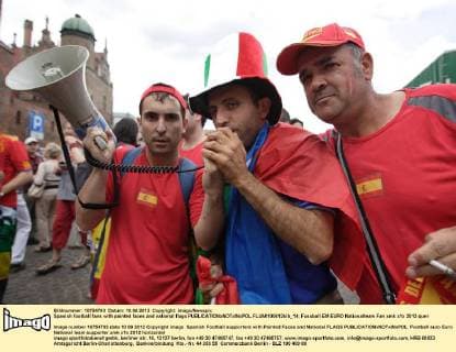 Spanish football fans with painted faces and national flags  FLUMI100612kib_14