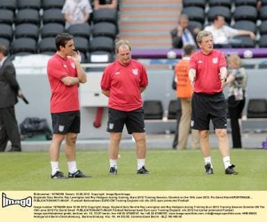 Englands Gary Neville, Ray Lewington and Roy Hodgson during training..Euro 2012 Training Session, Donetsk on the 10th June 2012. Pic David Klein SPORTIMAGE... EDITORIAL USE ONLY. No use with unauthorised audio, video, data, fixture lists, club league logos or live services. Online in-match use limited to 120 images, no video emulation. No use in betting, games or single club league player publications.