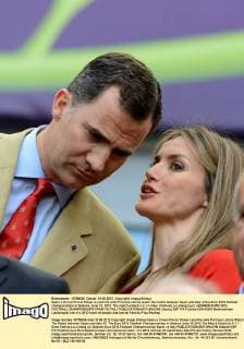 Spain s Crown Prince Felipe (L) and his wife Princess Letizia watch the match between Spain and Italy at the Euro 2012 football championships in Gdansk, June 10, 2012. The match ended in a 1-1 draw. (Xinhua Liu Lihang) (jyc) -GDANSK-EURO 2012 FOOTBALL CHAMPIONSHIPS-SPAIN VS ITALY 