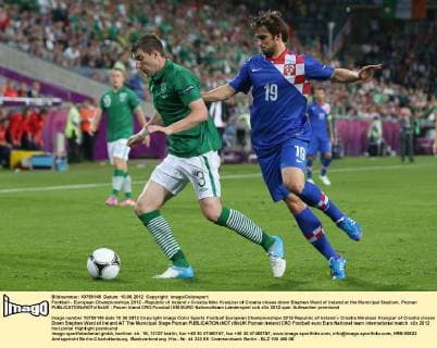 Football - European Championships 2012 - Republic of Ireland v Croatia Niko Kranjcar of Croatia closes down Stephen Ward of Ireland at the Municipal Stadium, Poznan 