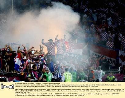 Croatian fans celebrate a goal..Euro 2012 Group Stage (Group C) match, at the Municipal Stadium, Poznan on the 10th June 2012. EDITORIAL USE ONLY. No use with unauthorised audio, video, data, fixture lists, club league logos or live services. Online in-match use limited to 120 images, no video emulation. No use in betting, games or single club league player publications.