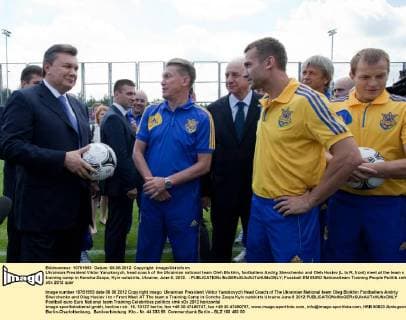 Ukrainian President Viktor Yanukovych, head coach of the Ukrainian national team Oleh Blokhin, footballers Andriy Shevchenko and Oleh Husiev (L to R, front) meet at the team s training camp in Koncha-Zaspa, Kyiv outskirts, Ukraine, June 8, 2012. - 