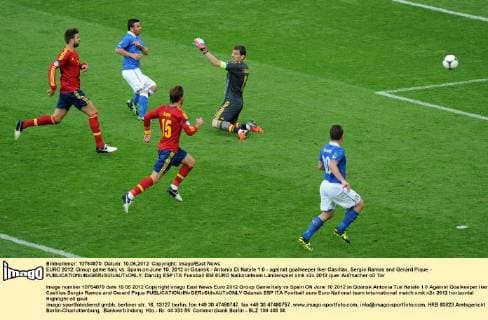 EURO 2012: Group game Italy vs. Spain on June 10, 2012 in Gdansk - Antonia Di Natale 1:0 - against goalkeeper Iker Casillas, Sergio Ramos and Gerard Pique - 