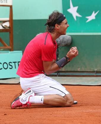 Spanish Rafael Nadal reacts after winning his French Open men s final match - Roland Garros in Paris - Nadals 7th French Open title -  PAR20120611702