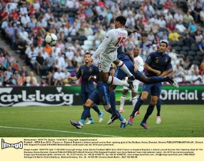 Football - UEFA Euro 2012 - France vs. England England s Joleon Lescott scores their opening goal at the Donbass Arena, Donetsk, Ukraine 