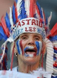 A French fan reacts before the Group D match between France and England at the Euro 2012 football championships in Donetsk, Ukraine, June 11, 2012. (Xinhua Li Yong)(lm) UKRAINE-DONETSK-EURO 2012-GROUP D-FANS 