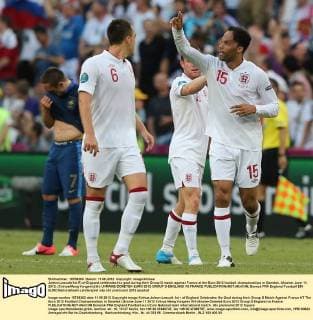 Joleon Lescott(1st R) of England celebrates his goal during their Group D match against France at the Euro 2012 football championships in Donetsk, Ukraine, June 11, 2012. (Xinhua Meng Yongmin)(kh) UKRAINE-DONETSK-EURO 2012-GROUP D-ENGLAND VS FRANCE 