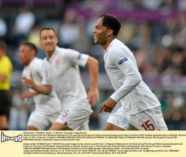 Joleon Lescott (front R) of England celebrates for his goal during the Group D match between England and France at the Euro 2012 football championships in Donetsk, Ukraine, June 11, 2012. (Xinhua Li Yong)(lm) UKRAINE-DONETSK-EURO 2012-GROUP D-FRANCE VS. ENGLAND 