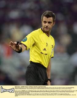 Referee Nicola Rizzoli in action..Euro 2012 France v England, Donetsk, Donbass Arena on the 11th June 2012. Pic David Klein SPORTIMAGE... EDITORIAL USE ONLY. No use with unauthorised audio, video, data, fixture lists, club league logos or live services. Online in-match use limited to 120 images, no video emulation. No use in betting, games or single club league player publications.