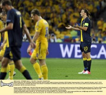 Zlatan Ibrahimovic (R) of Sweden reacts during their Group D match against Ukraine at the Euro 2012 football championships in Kiev, capital of Ukraine, June 11, 2012. (Xinhua Ma Ning)(kh) UKRAINE-KIEV-EURO 2012-GROUP D-UKRAINE VS SWEDEN 