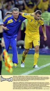 Andriy Shevchenko (R) of Ukraine celebrates his goal with head coach Oleh Blokhin during their Group D match against Sweden at the Euro 2012 football championships in Kiev, capital of Ukraine, June 11, 2012. (Xinhua Ma Ning)(kh) UKRAINE-KIEV-EURO 2012-GROUP D-UKRAINE VS SWEDEN 