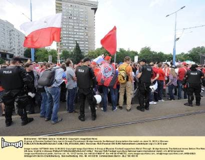 A group of Russian football fans march through Poniatowski Bridge towards the National Arena before the match on June 12, 2012 in Warsaw.  EN_01032928_0003