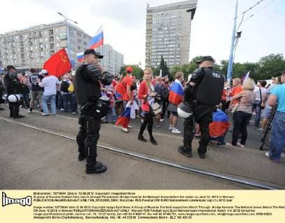 A group of Russian football fans march through Poniatowski Bridge towards the National Arena before the match on June 12, 2012 in Warsaw.  EN_01032928_0004