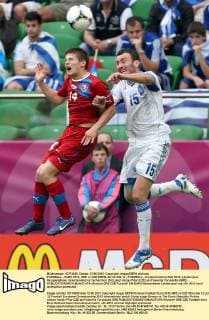 FUSSBALL - EURO 2012, GRE vs CZE BRESLAU,12.JUN.12 - FUSSBALL - Europameisterschaft 2012, Länderspiel, Gruppenphase, Griechenland vs Tschechien. Bild zeigt Vaclav Pilar (CZE) und Vassilis Torossidis (GRE). 