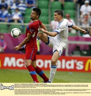 Milan Baros (L) KYRIAKOS PAPADOPOULOS (R) EURO 2012: football championship Group A match Greece vs. Czech Republic on June 12, 2012 in Wroclaw. Czech Republic wins 2:0 against Greece after the first half of the match  EN_01032930_0003